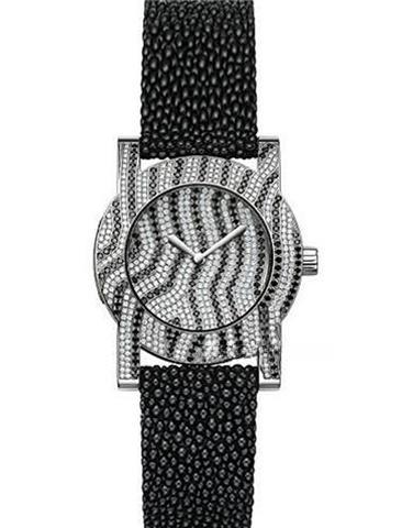 CARL F. BUCHERER